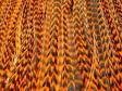 we offer bright colored grizzly rooster feathers at affordable prices